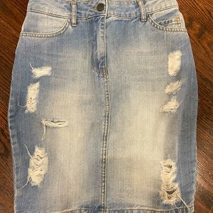 Distressed mini jean skirt